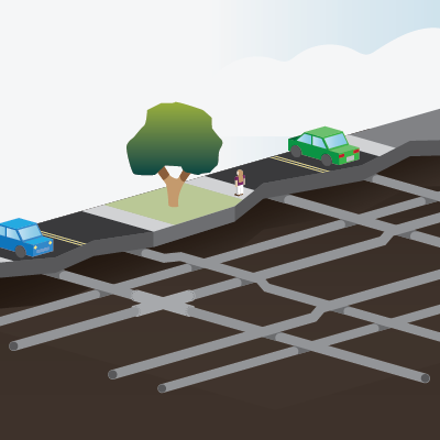 Image of a parking lot, a girl, two cars and a tree. Parking lot's surface is cut away to reveal water pipes underneath.