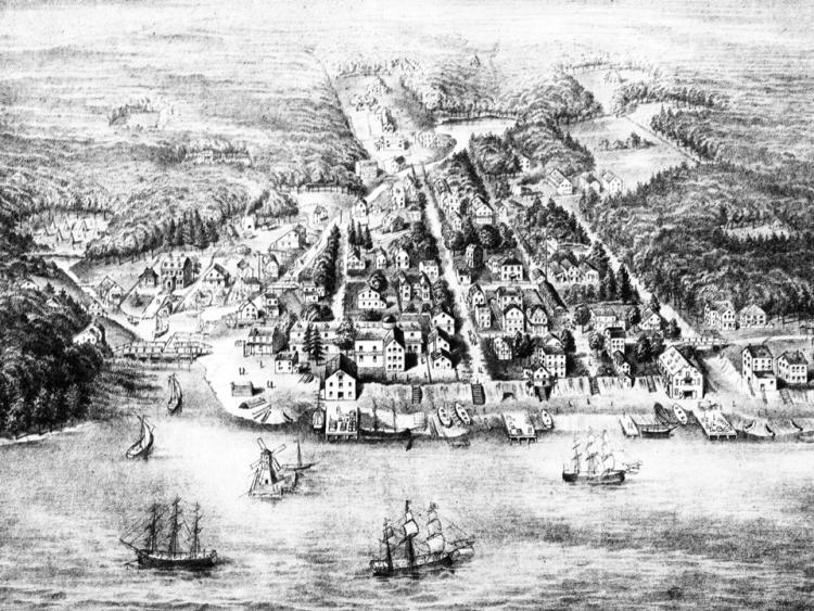 Black-and-white drawing of Philadelphia in the early 18th century, showing roads, houses, other types of buildings and streams