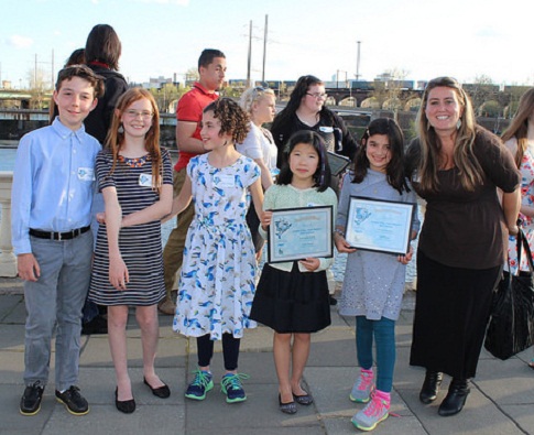 Winners from the K-2nd grade category celebrate along the Schuylkill with judge Tiffany Ledesma. Photo: Brian Rademaekers 
